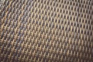 Synthetic rattan texture weaving background as used on outdoor garden furniture. photo