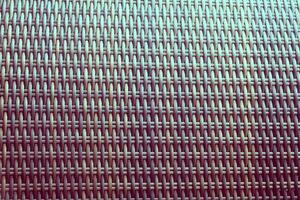 Synthetic rattan texture weaving background as used on outdoor garden furniture. photo