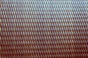 Synthetic rattan texture weaving background as used on outdoor garden furniture. photo