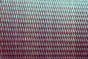 Synthetic rattan texture weaving background as used on outdoor garden furniture. photo