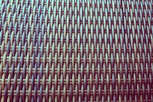 Synthetic rattan texture weaving background as used on outdoor garden furniture. photo