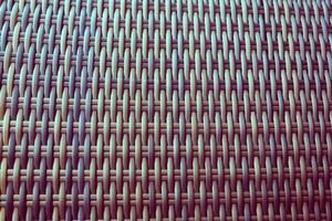 Synthetic rattan texture weaving background as used on outdoor garden furniture. photo