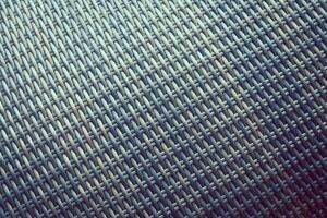 Synthetic rattan texture weaving background as used on outdoor garden furniture. photo