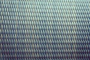 Synthetic rattan texture weaving background as used on outdoor garden furniture. photo