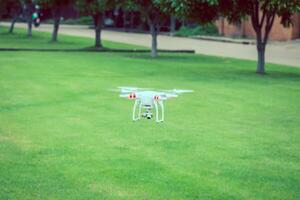 flying drone with camera prepair to fly photo