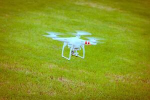 flying drone with camera prepair to fly photo