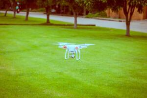 flying drone with camera prepair to fly photo