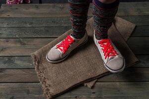 Color socks on a wooden floor photo