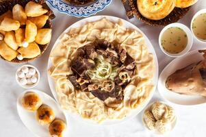 National Kazakh dishes, Beshparmak, Manty, Baursak photo