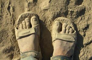 Feet in the dust photo