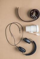 Cup, belt, earphones photo