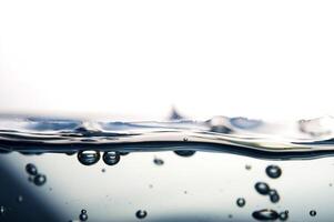 Fresh water with waves and bubbles photo