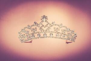 Tiara on a pink background photo