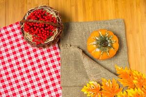 Yellow and red flowers on the table. photo