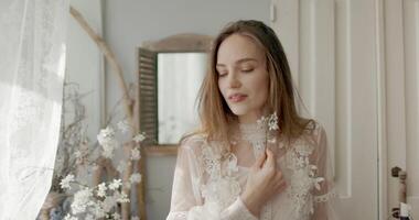 Portrait of beautiful fashionable woman with natural flawless skin, wearing vintage style dress. Spring beauty concept video