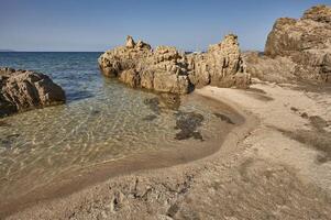 The small natural beach of Sardinia. photo