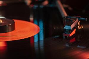 Needle detail on vinyl record on turntable 6 photo