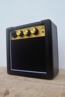 Closeup photo of a mini guitar amplifier that has good sound