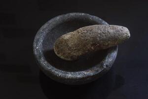 Stone mortar and stone grinder from Indonesia called Layah, Ulegan or Cobek photo