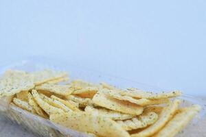 net chips in a plastic container that tastes good photo