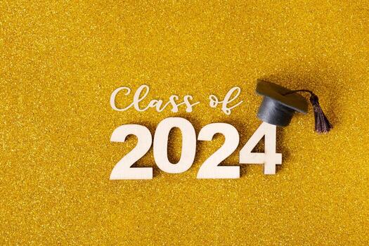 Class of 2024 text. Golden glitter background with number 2024 and graduated cap photo