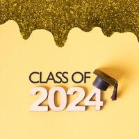 Class of 2024 text with graduation cap. Graduation holiday concept. photo