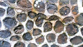 Texture of a stone wall. Old castle stone wall texture background. Stone wall as a background or texture. photo