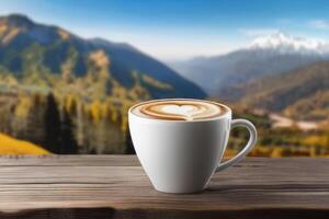 A steaming cup of coffee against the backdrop of autumn mountains. Wooden table and cup of coffee in the mountains in autumn. Autumn season, free time, coffee break, September, October photo