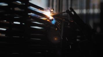 Welding of metal reinforcement on the construction site. Sparks from welding. video