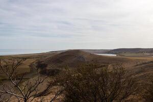 Landscape photo from the view at the top of The Enisala Medieval Fortress near Jurilovca in Tulcea, Romania.