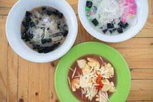 black cincau hitam es campur condensed milk mix ice, traditional food from Indonesia photo