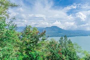 mountain and lake Batur in Bali scenic view photo