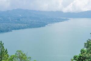 mountain and lake Batur in Bali scenic view photo