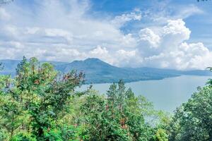 mountain and lake Batur in Bali scenic view photo