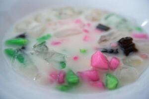 black cincau hitam es campur condensed milk mix ice, traditional food from Indonesia photo