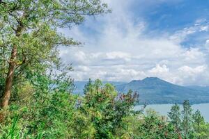 mountain and lake Batur in Bali scenic view photo