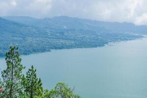 mountain and lake Batur in Bali scenic view photo