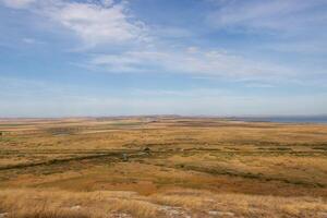 Landscape photo from the view at the top of The Enisala Medieval Fortress near Jurilovca in Tulcea, Romania.