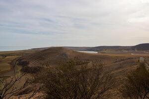 Landscape photo from the view at the top of The Enisala Medieval Fortress near Jurilovca in Tulcea, Romania.