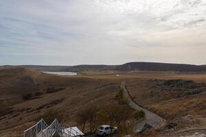 Landscape photo from the view at the top of The Enisala Medieval Fortress near Jurilovca in Tulcea, Romania.