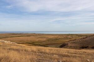 Landscape photo from the view at the top of The Enisala Medieval Fortress near Jurilovca in Tulcea, Romania.