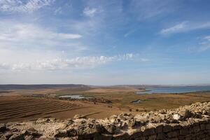 andscape photo from the top of The Enisala Medieval Fortress near Jurilovca in Tulcea, Romania.