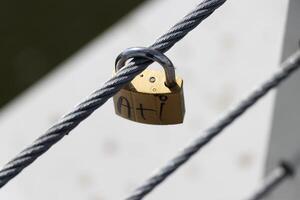 Photo of a padlock on the fence