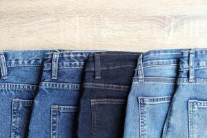 beautiful fashion jeans Stacked in layers at the jeans store photo