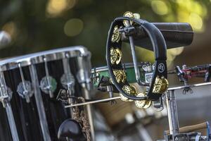 Fratta Polesine Italy 10 December 2023 Close up of a tambourine a pivotal instrument in a live concert capturing its rhythmic essence photo