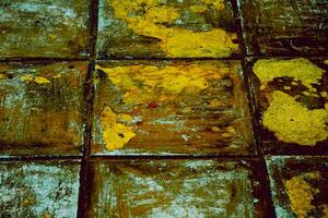 Dirty brown yellow checkered tiled abstract background wall,floor photo