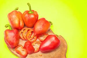 Sweet red ripe pepper on cutting board.Cooking, kitchen photo