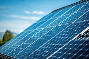 Blue solar panels with clear sky backdrop photo