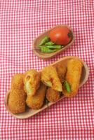 Indonesian food with a mixture of flour and vegetables which is called Risoles photo