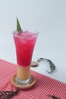 Close up photo of red soda mixed with milk is called Soda Susu or Soda Gembira